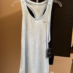 Nike dri fit. Brand new. Never worn. With tags. Great color!